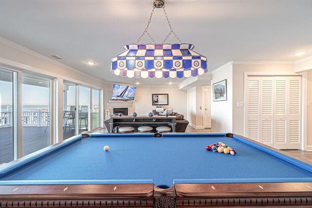 game room with recessed lighting, a fireplace, visible vents, baseboards, and ornamental molding