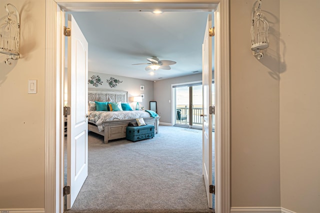 bedroom with carpet floors, access to outside, baseboards, and a ceiling fan