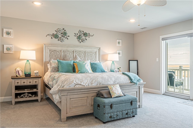 bedroom featuring carpet, access to outside, and baseboards