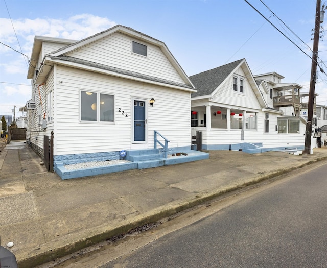 view of front of house featuring a shingled roof