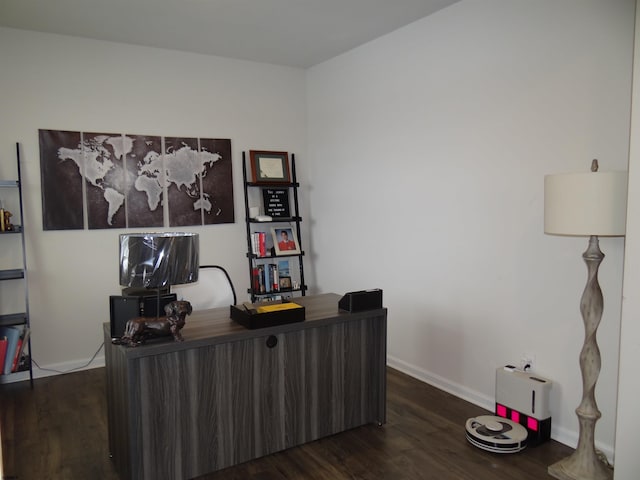 office space featuring dark wood-style floors and baseboards