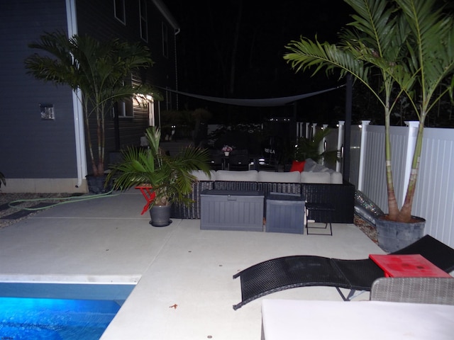 view of patio / terrace featuring fence