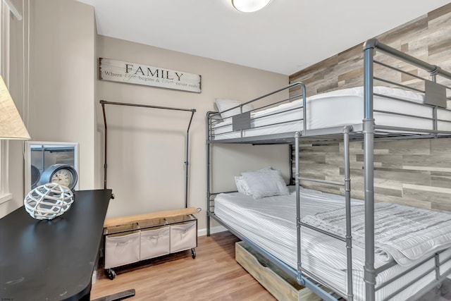 bedroom featuring wood finished floors