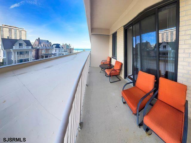 balcony featuring a sunroom