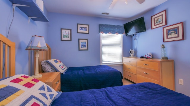 bedroom with visible vents and a ceiling fan