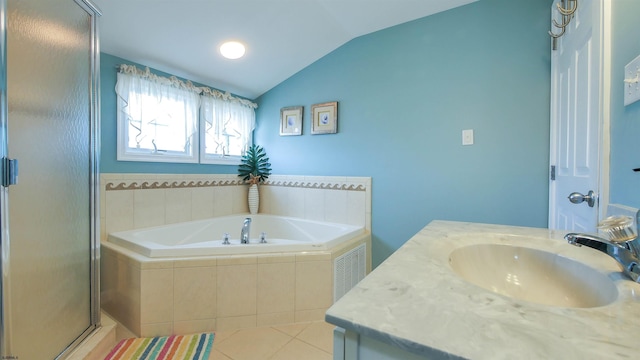 full bath featuring a stall shower, a garden tub, tile patterned flooring, vaulted ceiling, and vanity