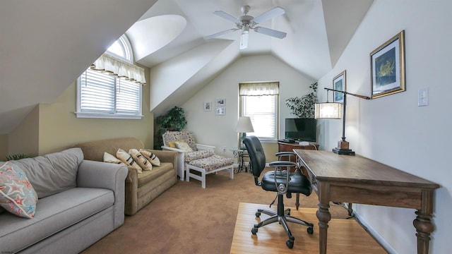 office area with carpet, ceiling fan, and vaulted ceiling