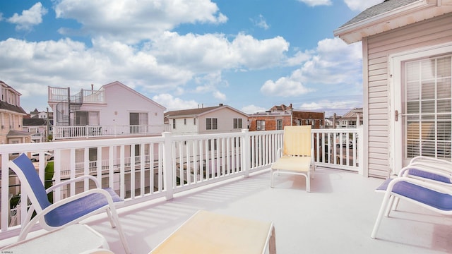 balcony featuring a residential view