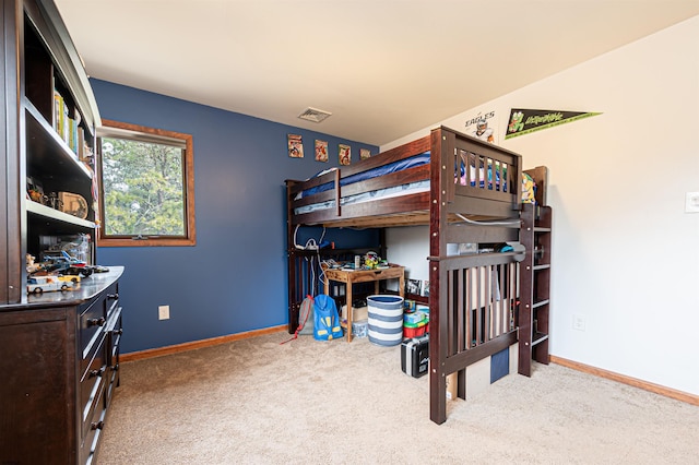 bedroom featuring carpet flooring, visible vents, and baseboards