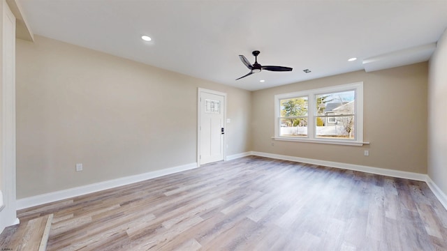 unfurnished room featuring visible vents, baseboards, ceiling fan, wood finished floors, and recessed lighting