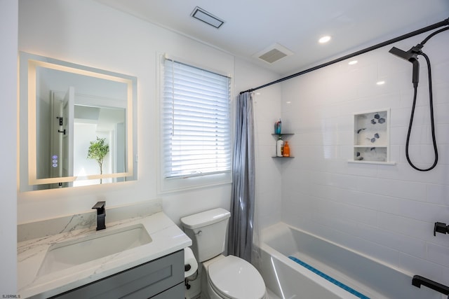 full bath with toilet, visible vents, shower / tub combo with curtain, and vanity