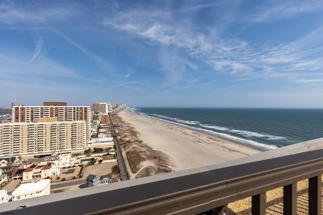 property view of water featuring a beach view