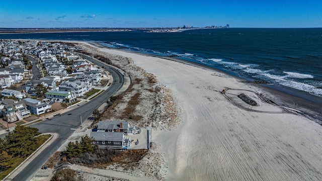 aerial view with a view of the beach and a water view