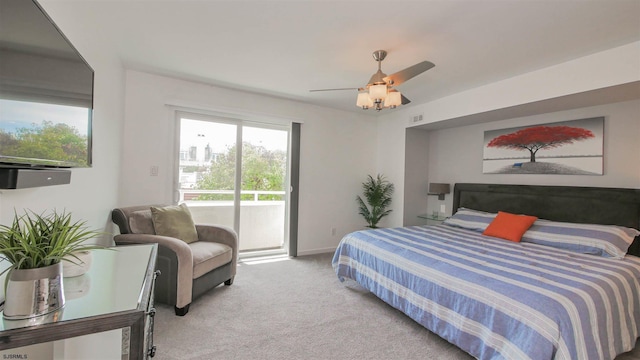 carpeted bedroom with a ceiling fan, access to outside, visible vents, and baseboards