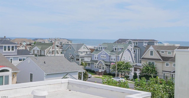 bird's eye view with a residential view and a water view