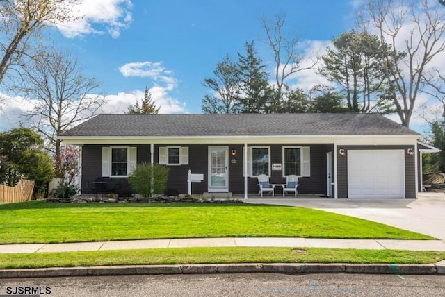 single story home featuring a porch, an attached garage, driveway, and a front lawn