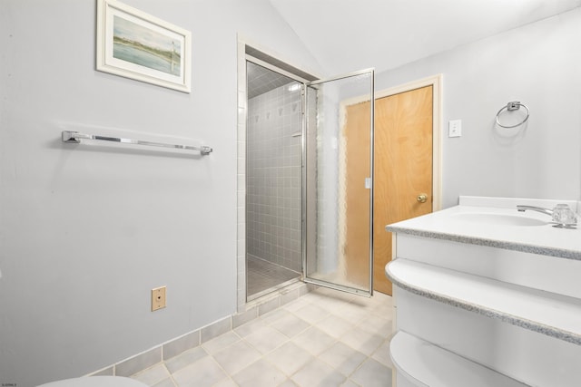 full bathroom with lofted ceiling, a stall shower, toilet, and vanity