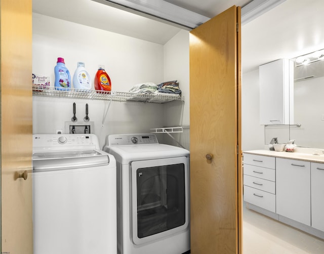 clothes washing area with laundry area and washing machine and clothes dryer