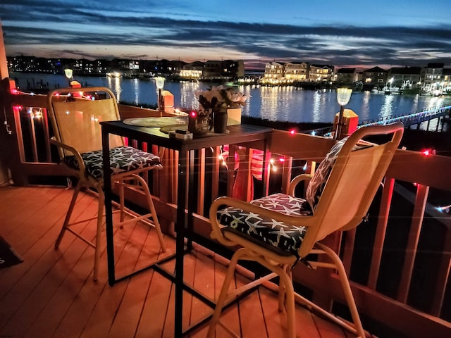 balcony featuring a water view