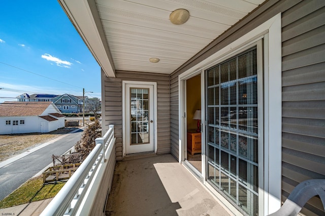 balcony featuring a residential view