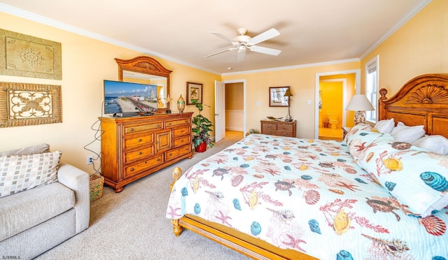 bedroom featuring ornamental molding, light colored carpet, and a ceiling fan