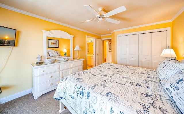 bedroom with baseboards, ceiling fan, crown molding, carpet floors, and a closet