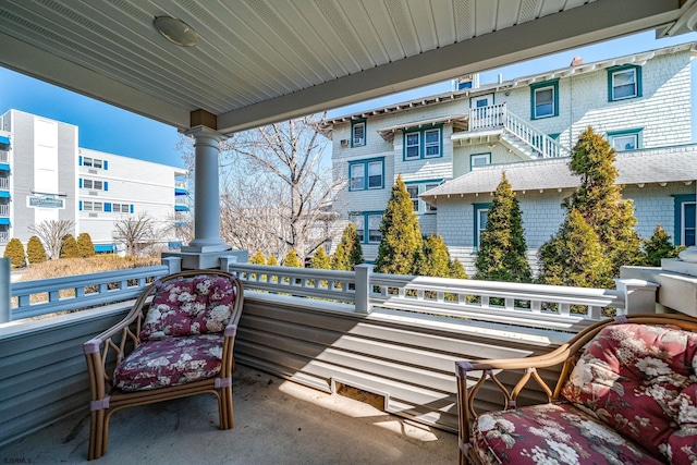 balcony featuring covered porch