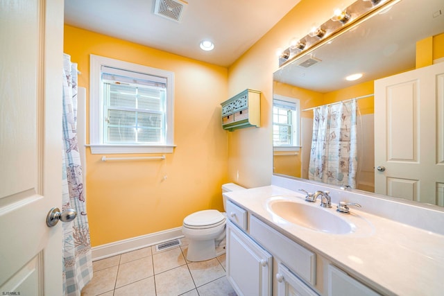 bathroom with toilet, baseboards, visible vents, and tile patterned floors