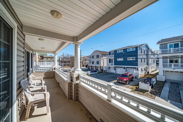 balcony featuring a residential view