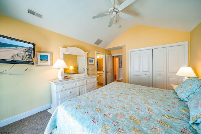 carpeted bedroom featuring a closet, visible vents, vaulted ceiling, and baseboards