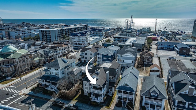 drone / aerial view featuring a water view