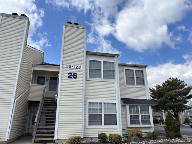 view of property with stairs