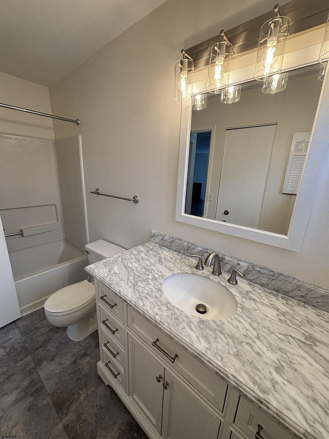 full bathroom featuring shower / bathing tub combination, vanity, and toilet