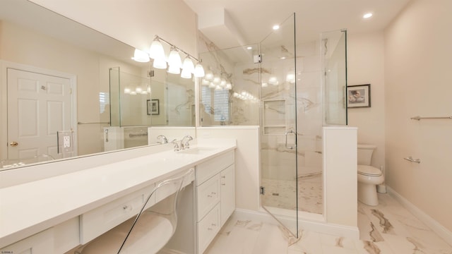 full bath featuring a marble finish shower, baseboards, toilet, marble finish floor, and vanity