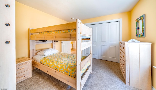 bedroom with light colored carpet