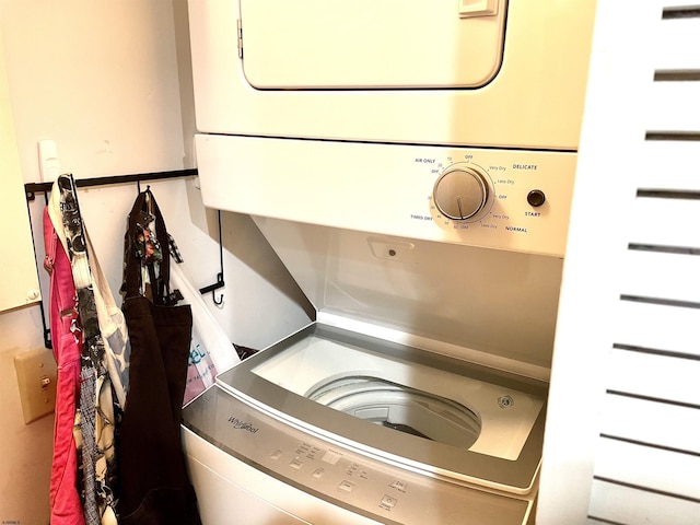 laundry room featuring laundry area and stacked washer and dryer