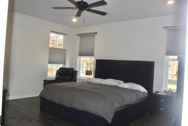 bedroom featuring recessed lighting, a ceiling fan, baseboards, and dark wood-style flooring