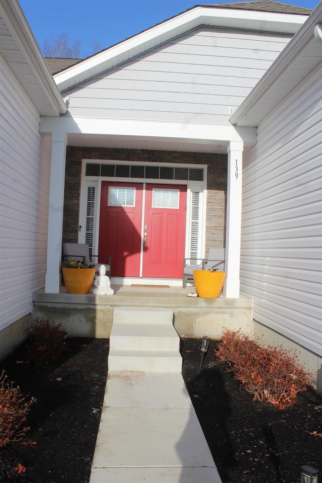 property entrance with a porch