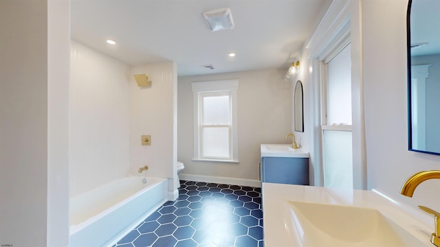 full bathroom with visible vents, toilet, a bathtub, recessed lighting, and vanity