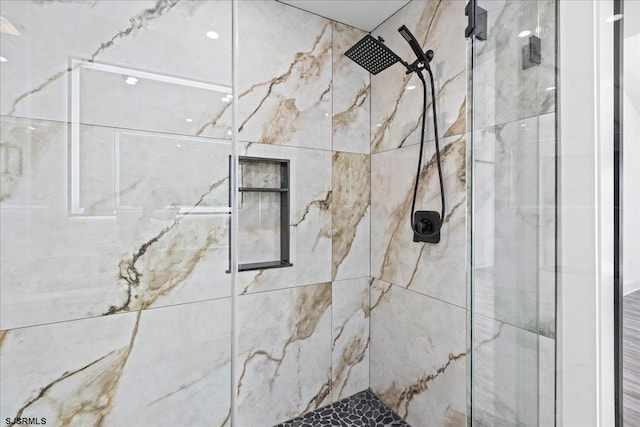 room details featuring a shower stall