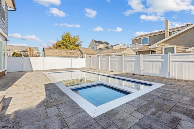 view of swimming pool with a patio, a fenced backyard, and a fenced in pool