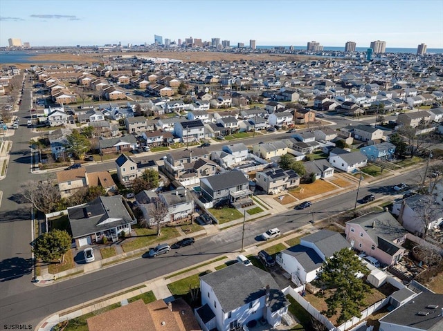 birds eye view of property featuring a residential view and a city view