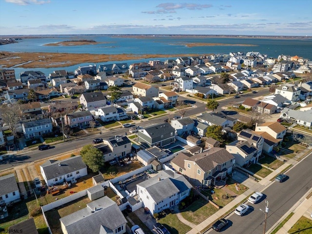 aerial view with a residential view and a water view