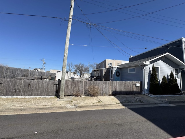 exterior space with sidewalks and curbs