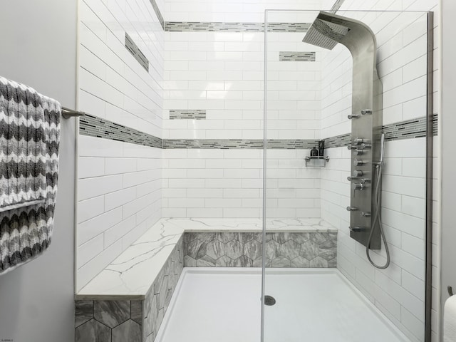 full bath featuring a stall shower