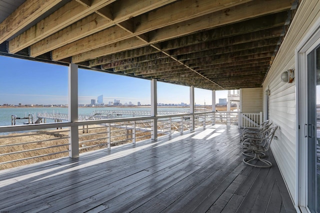 deck featuring a city view and a water view