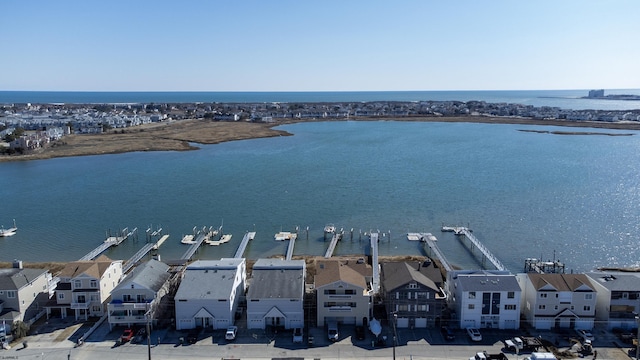 aerial view with a residential view and a water view