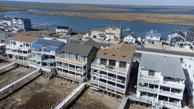 aerial view with a residential view and a water view