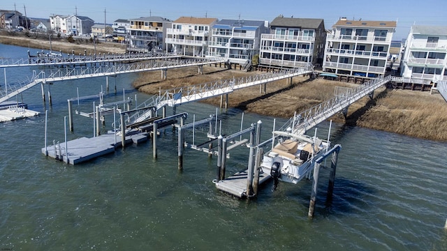 view of dock with a water view and boat lift