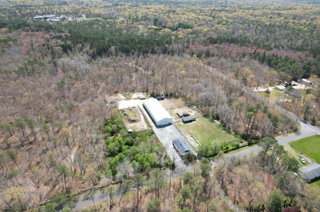 bird's eye view featuring a view of trees